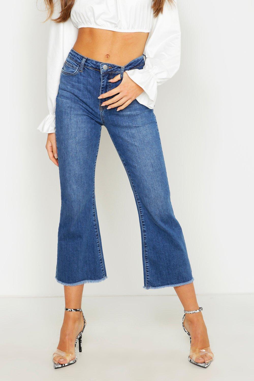 Mid Rise Cropped Kick Flare Jean | boohoo